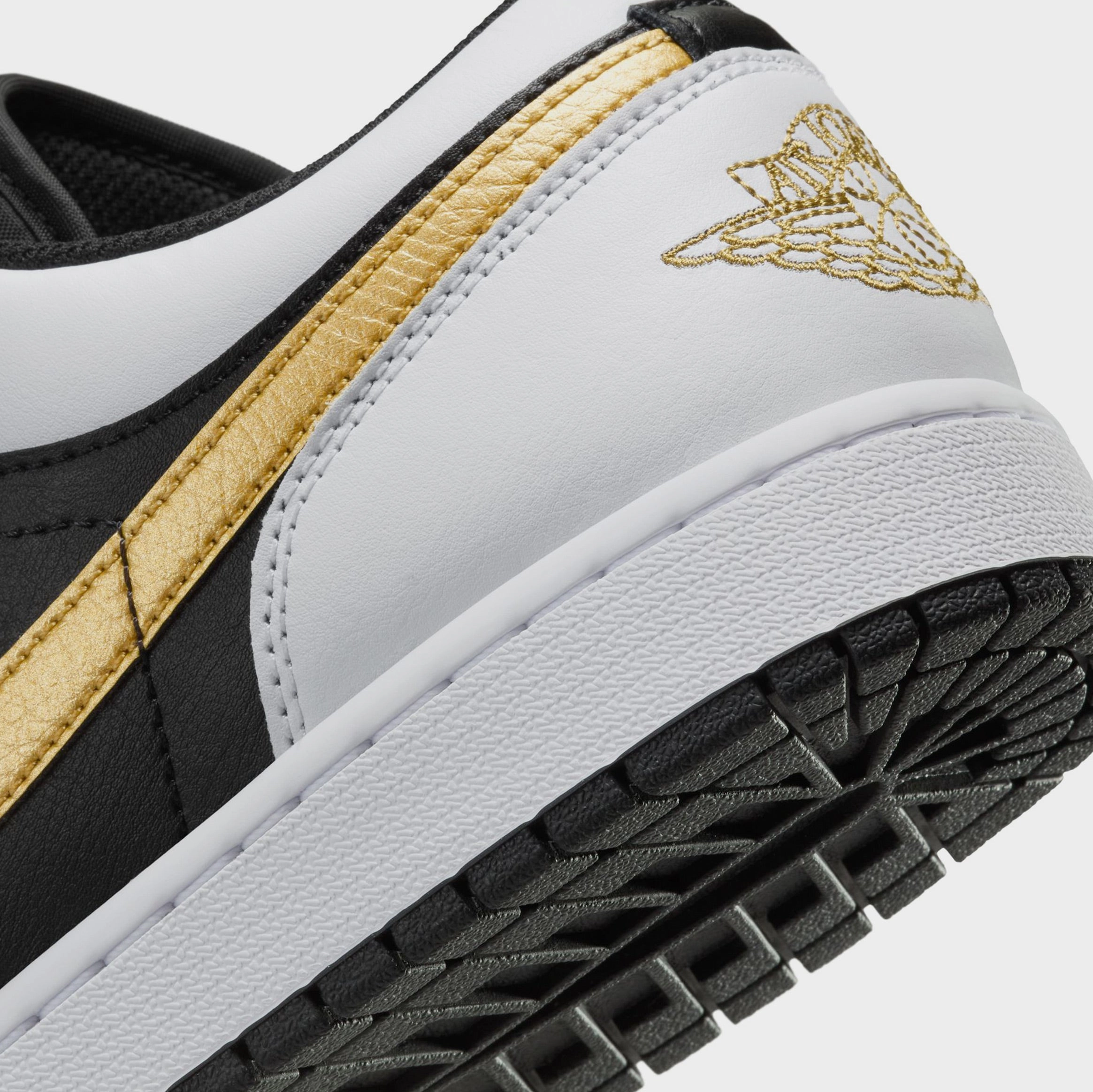 Air Jordan 1 Low Gold Swoosh Mens Lifestyle Shoes (White/Black/Gold) Air Jordan 1 original design shoes
