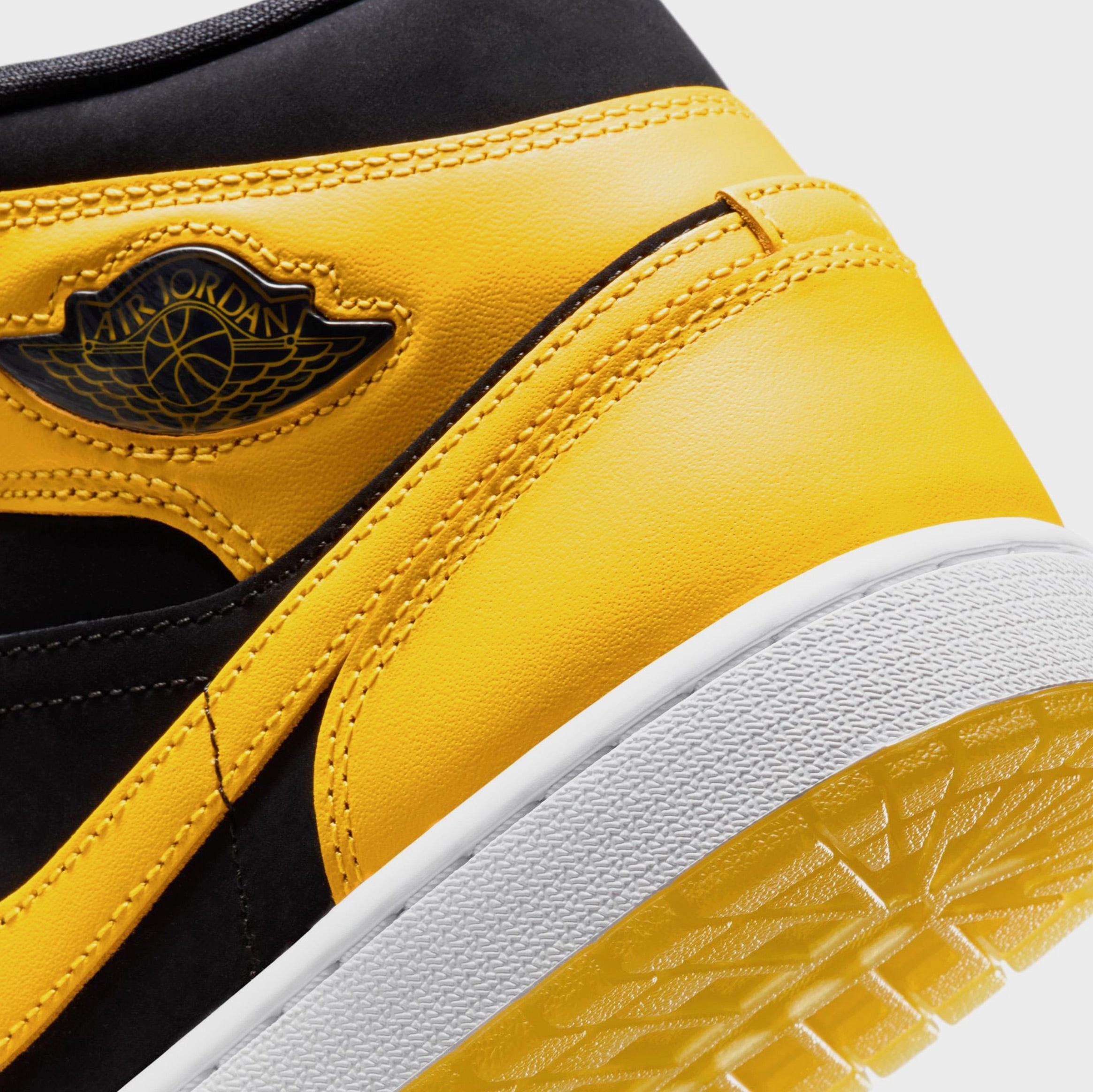 Air Jordan 1 Mid Mens Lifestyle Shoes (Black/Varsity Maize/White) Air Jordan 1 original design shoes