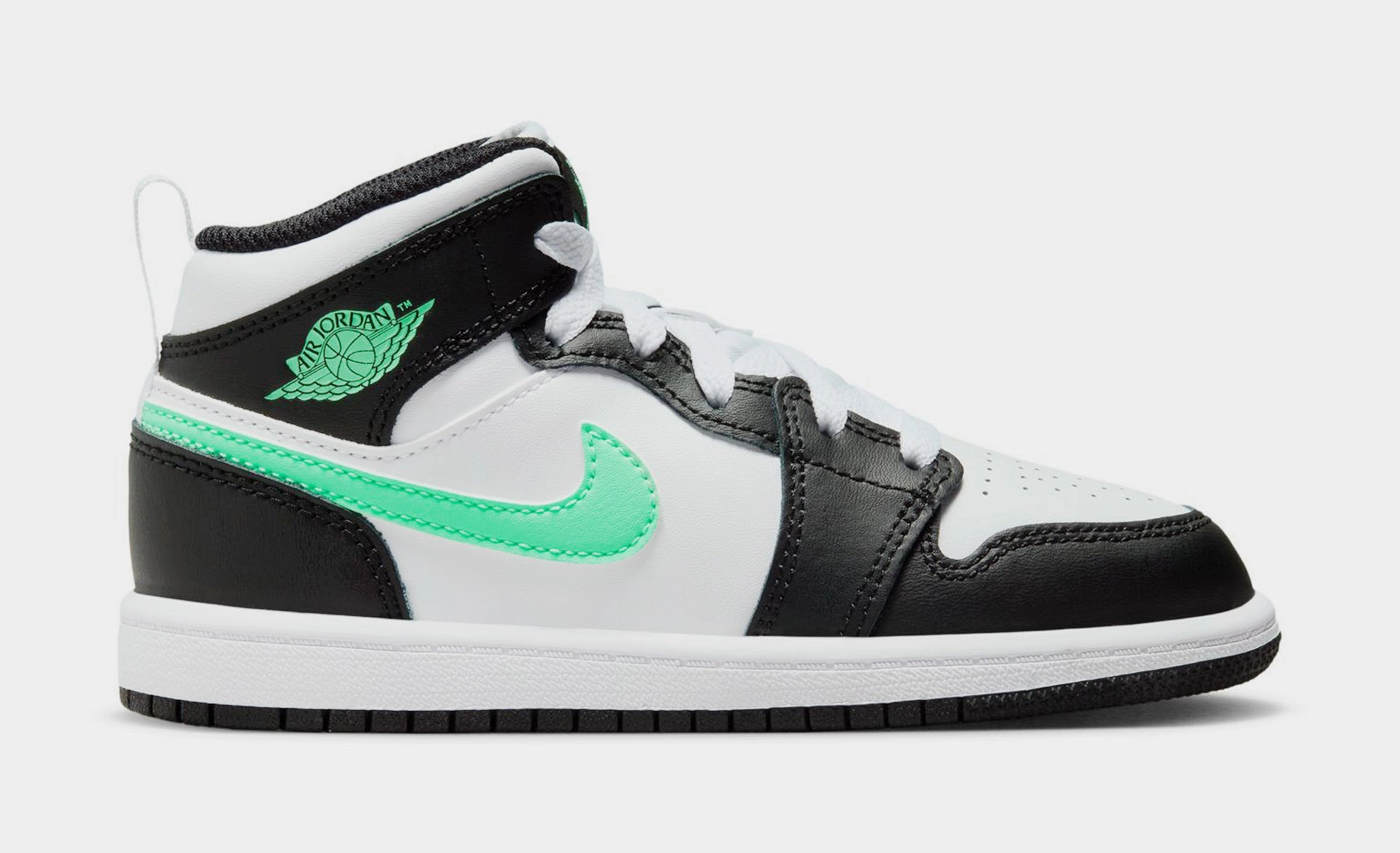 Air Jordan 1 Mid Preschool Lifestyle Shoes (White/Green Glow/Black) Air Jordan 1 classic shoes for streetwear looks
