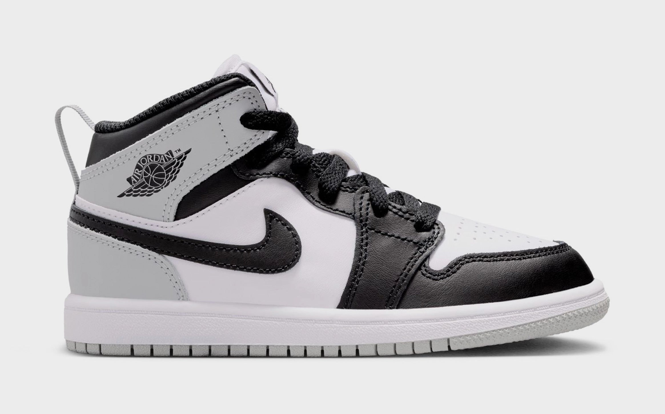 Air Jordan 1 Mid Preschool Lifestyle Shoes (White/Light Smoke Grey/Black) Air Jordan 1 classic shoes for streetwear looks