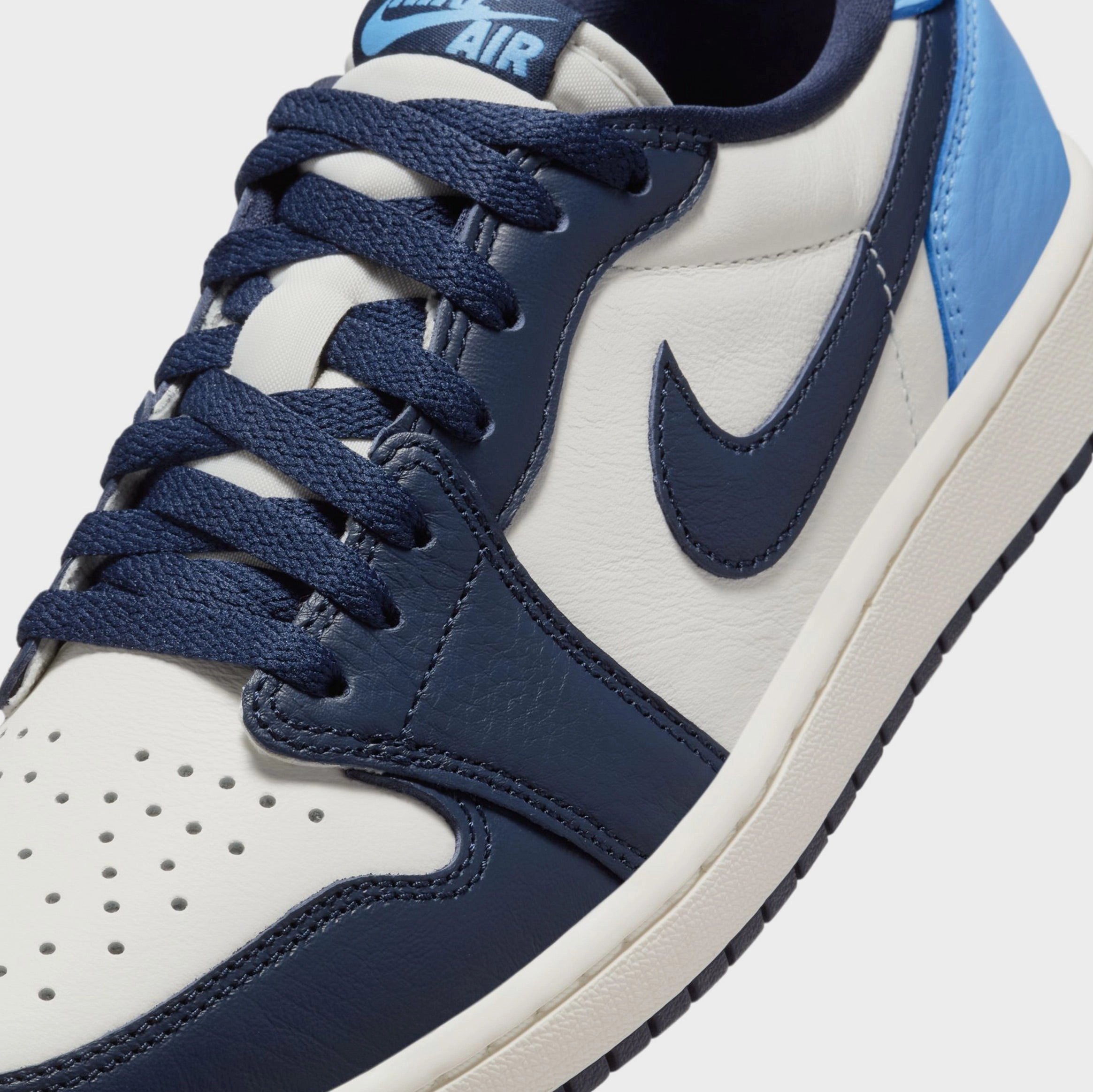 Air Jordan 1 Retro Low OG Obsidian Mens Lifestyle Shoes (Obsidian/University Blue/Sail) Air Jordan 1 original design shoes