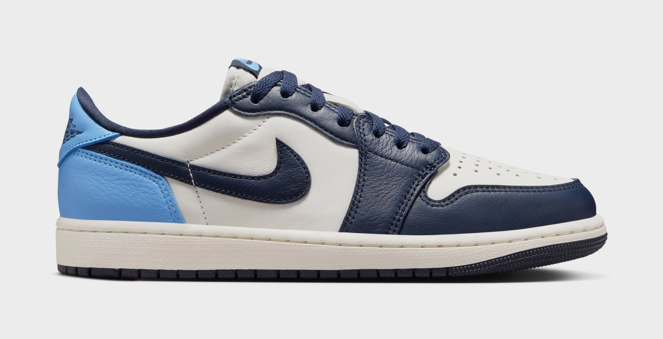 Air Jordan 1 Retro Low OG Obsidian Mens Lifestyle Shoes (Obsidian/University Blue/Sail) Air Jordan 1 classic shoes for streetwear looks