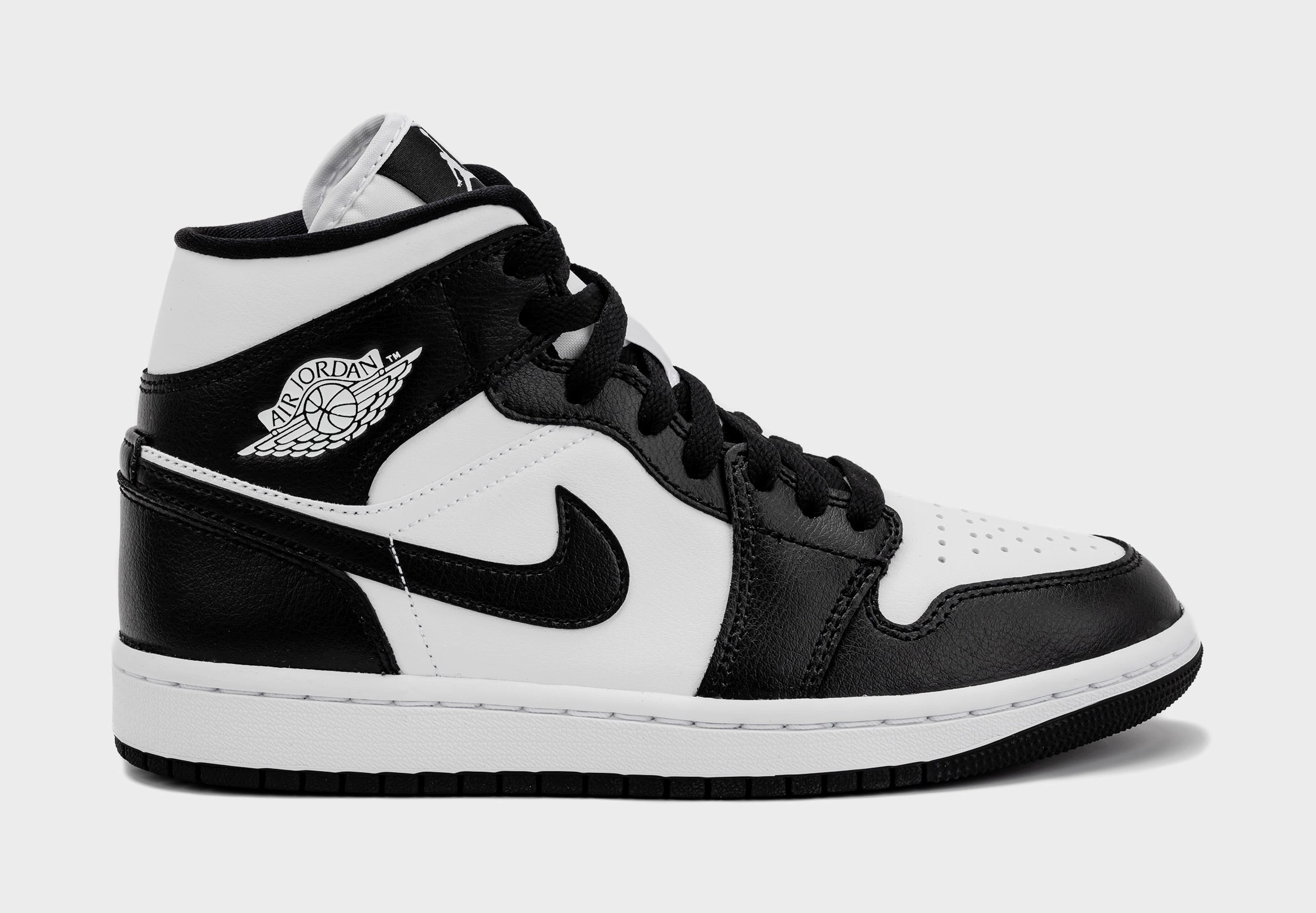 Air Jordan 1 Retro Mid Panda Womens Lifestyle Shoes (Black/White) Air Jordan 1 classic shoes for streetwear looks