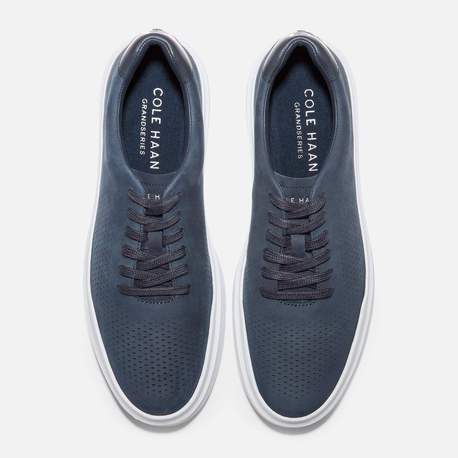 Grandpro Rally Laser Cut Sneaker Cole Haan hybrid dress sneakers