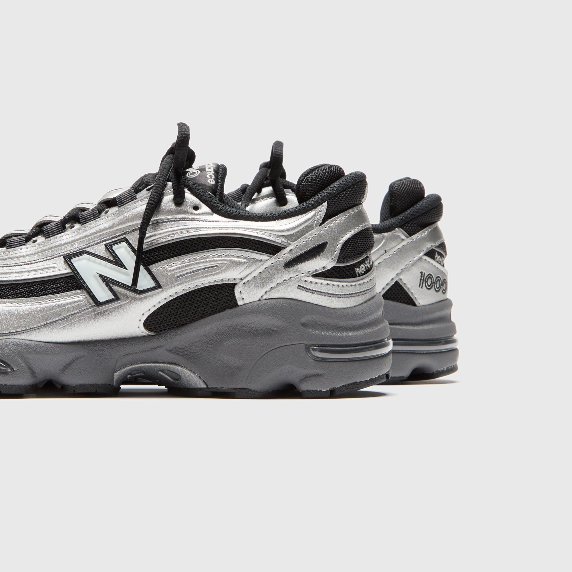New Balance M1000 - Silver Metallic Nike Air Force 1 edition