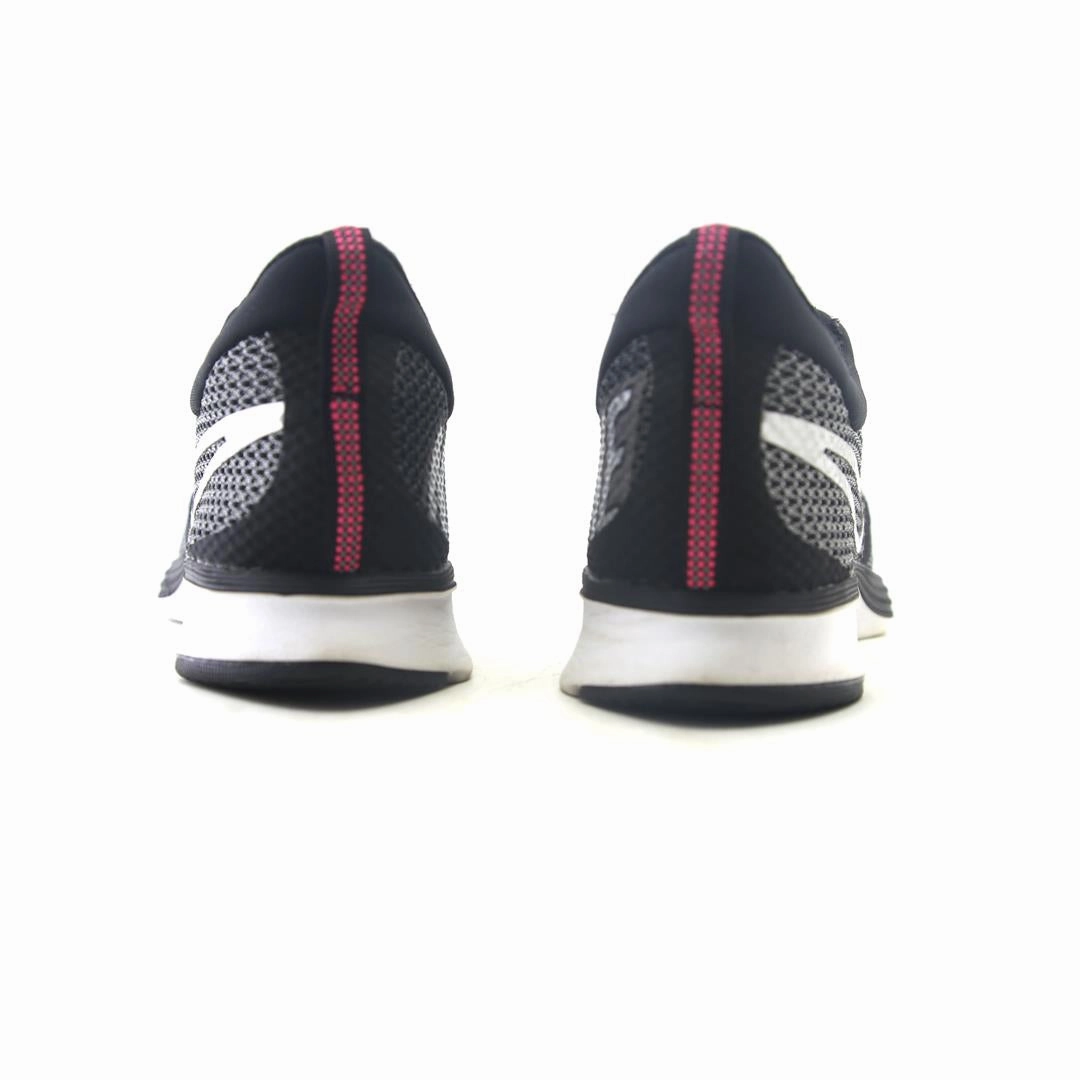 NIKE AIR ZOOM STRIKE sleek Nike sneaker angles